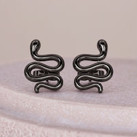 Designer Snake Stud Black Metal Gold Earrings