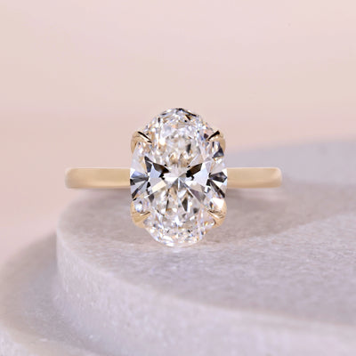 Oval cut engagement ring with elegant diamond setting