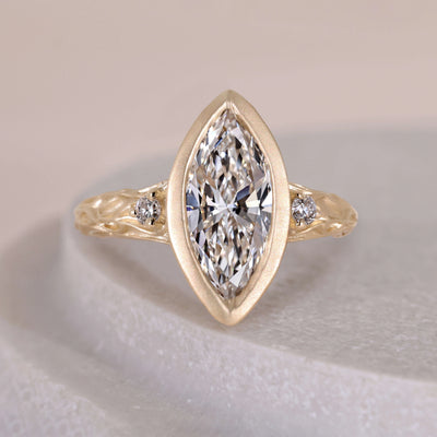 marquise diamond ring bezel set design
