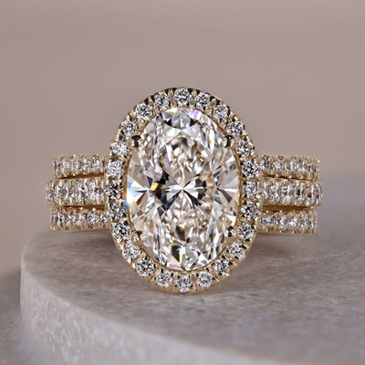 2 carat oval diamond bridal ring set yellow gold
