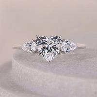 Heart Shape Three Stone Engagement Ring With Pear Side Stone