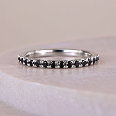 Half eternity band with brilliant diamond accents across the band

