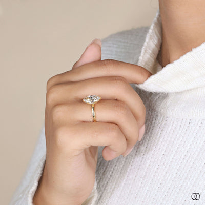 Antique style marquise diamond ring in yellow gold

