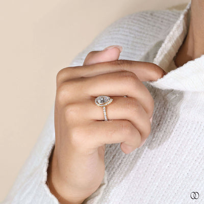Pave engagement ring paired with pear engagement ring style
