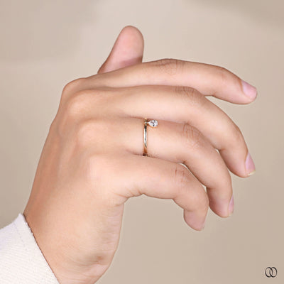 pear cut ring dangle bezel set gold ring
