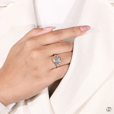 yellow gold bezel set emerald diamond ring
