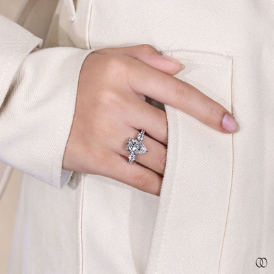 White gold pear cut diamond engagement ring with claw prongs
