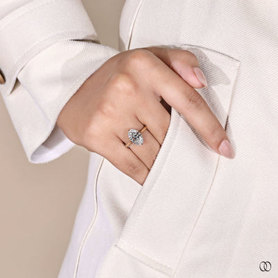 Lab grown oval cut diamond ring with claw prong and cathedral style
