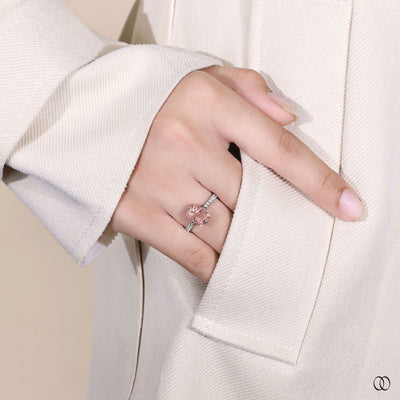 Unique elongated cushion cut diamond ring with hidden halo
