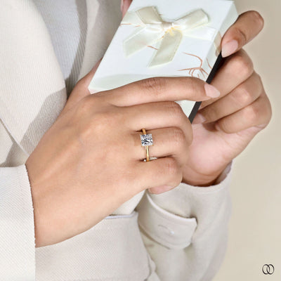 Unique engagement ring featuring princess cut diamond
