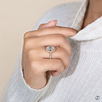 Unique oval engagement ring with cathedral setting
