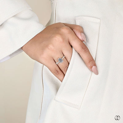 Unique emerald cut engagement ring with hidden halo
