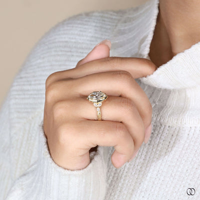 Milgrain setting ring enhancing marquise cut diamond
