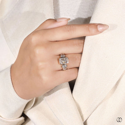 5 stone radiant diamond bezel set gold ring
