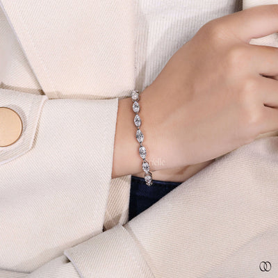 designer diamond tennis bracelet marquise gold

