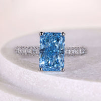 Blue Radiant Cut Diamond Engagement Ring With Pave Set