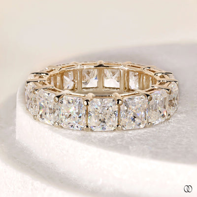 prong setting band yellow gold moissanite ring
