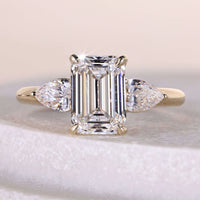 Three Stone Pear And Emerald Cut Diamond Engagement Ring