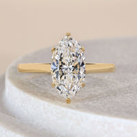 Marquise Engagement Ring In Yellow Gold With Hidden Halo