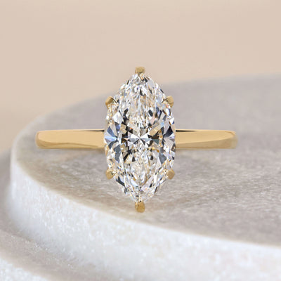  Handmade marquise diamond ring with claw prong design
