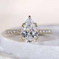 Pear Cut Diamond Ring With Double Claw Prong Pave Design