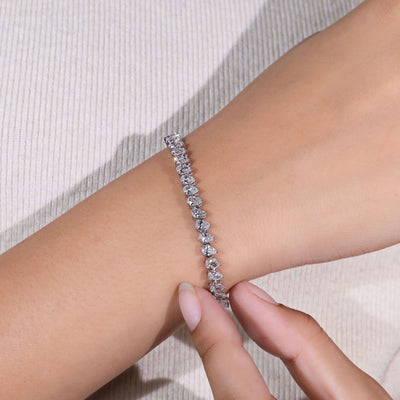 pear diamond tennis bracelet white gold prong set
