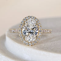 Oval Diamond Halo Engagement Ring In Pave
