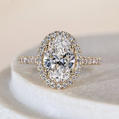Oval Diamond Halo Engagement Ring in Pave