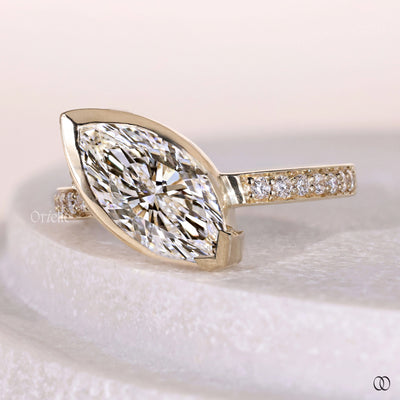 bezel set engagement ring marquise diamond gold ring
