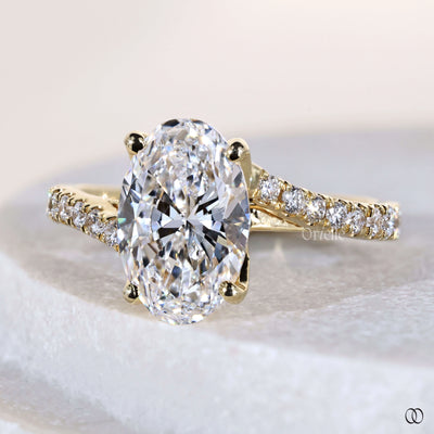 Unique oval cut engagement ring with bypass setting

