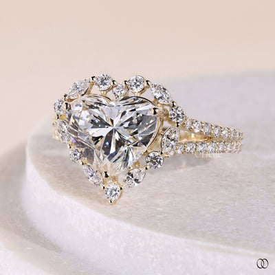 Handmade heart shaped diamond ring with split shank halo setting
