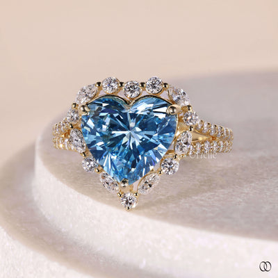 round marquise side stone heart diamond ring
