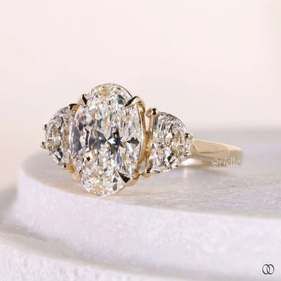 yellow gold ring oval three stone engagement ring
