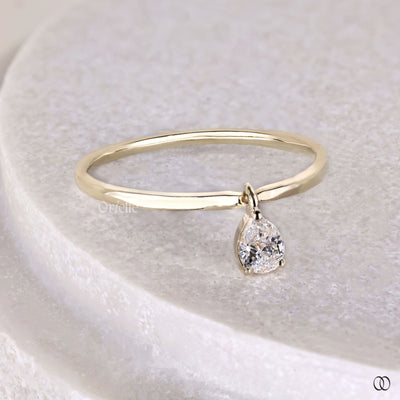 designer wedding ring pear cut yellow gold
