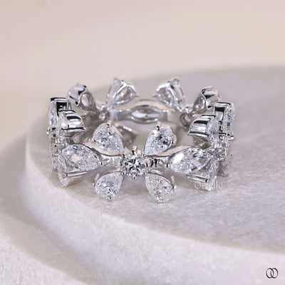 white gold prong set pear marquise round diamond wedding band
