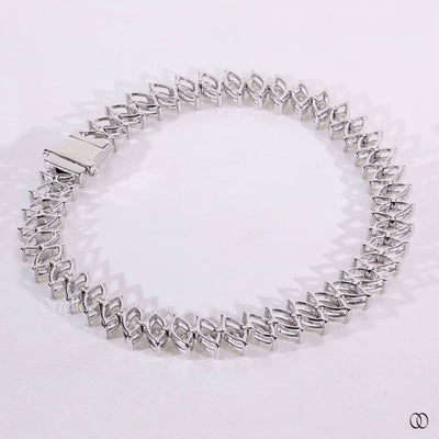white gold marquise diamond prong set tennis bracelet
