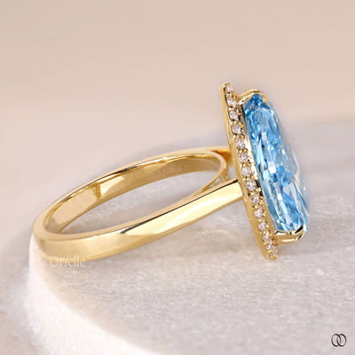fancy vivid blue diamond yellow gold ring
