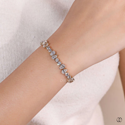 prong set diamond tennis bracelet yellow gold
