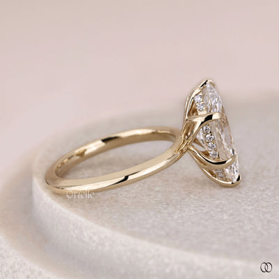 Marquise cut single solitaire diamond ring with tulip prong setting
