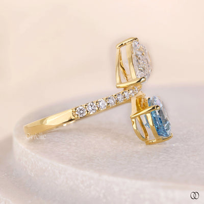 yellow gold engagement ring blue diamond ring
