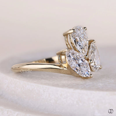 yellow gold ring bypass three stone diamond ring
