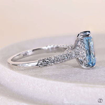 Radiant cut diamond ring with cathedral setting in white gold band

