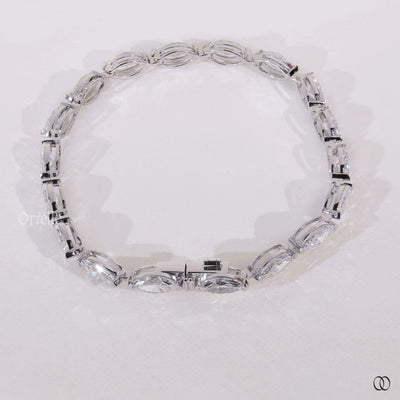 white gold marquise diamond tennis bracelet design

