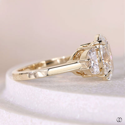 side stone half moon oval diamond ring
