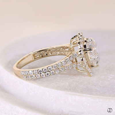 Unique heart shaped diamond engagement ring with halo diamonds
