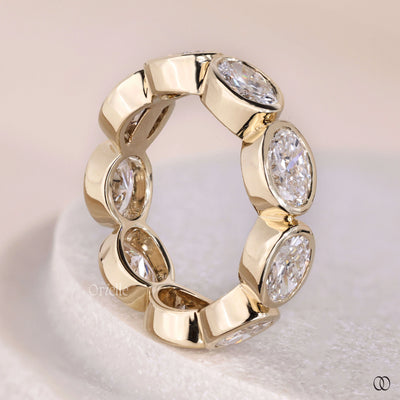 full eternity band oval diamond yellow gold ring
