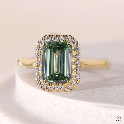 yellow gold diamond ring emerald halo setting
