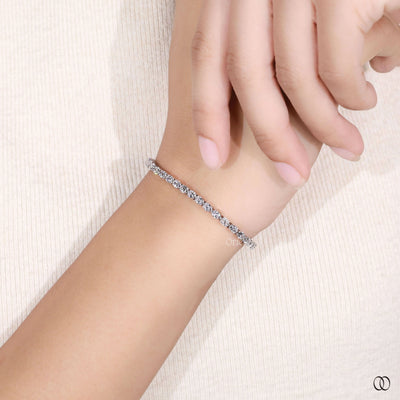 shared prong oval diamond tennis bracelet