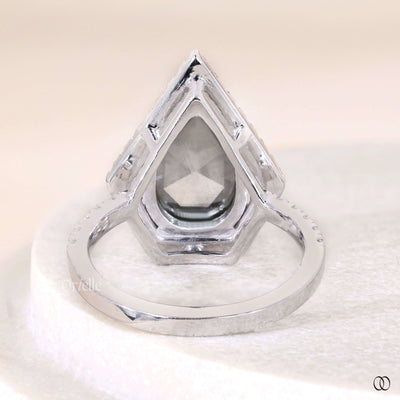 salt and pepper ring pear cut halo setting
