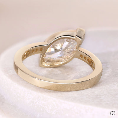 channel set pave ring marquise diamond gold ring
